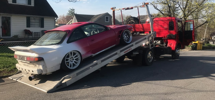 cheapest long distance car towing